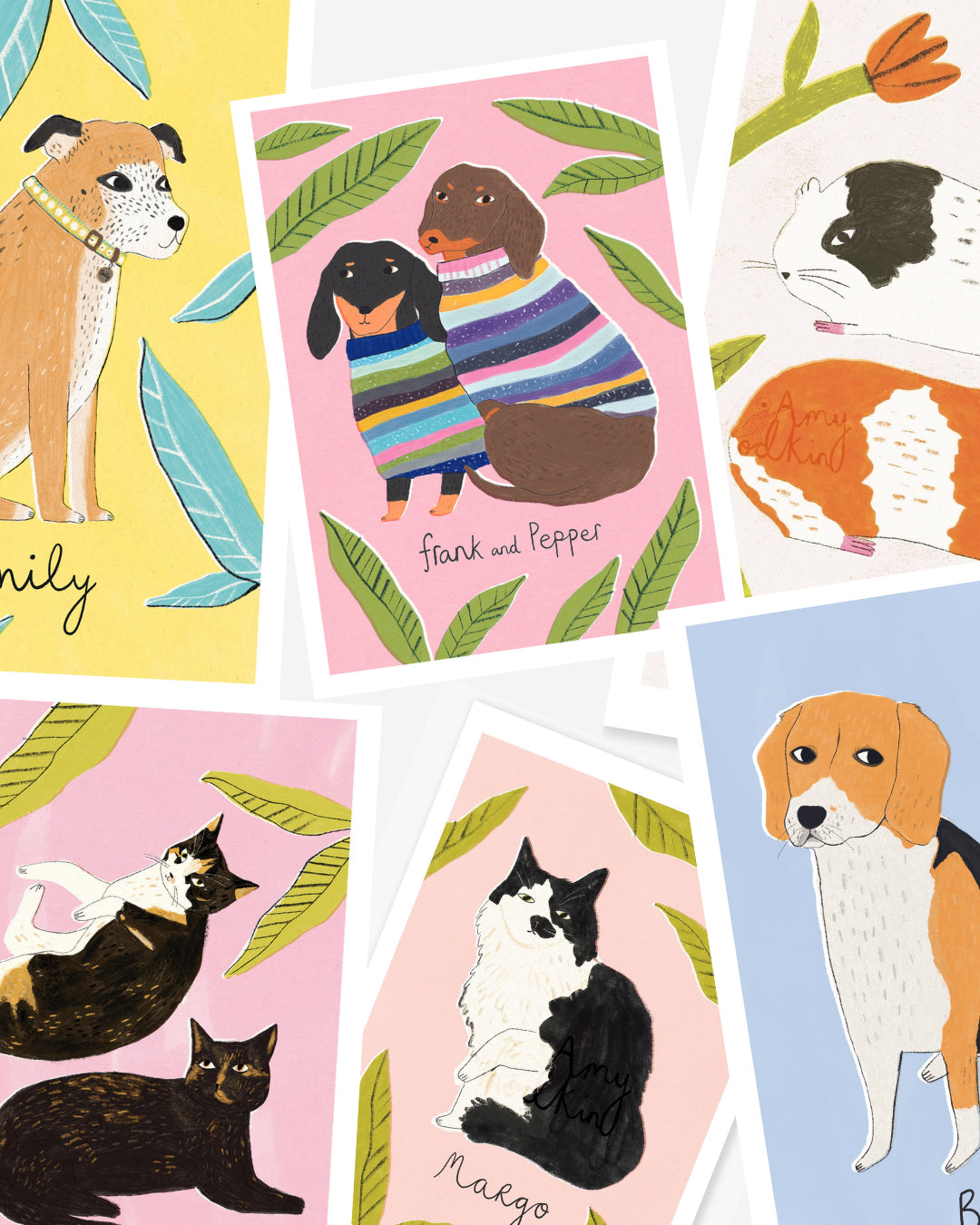 Collection of art prints featuring illustrations of dogs and cats on colorful backgrounds.